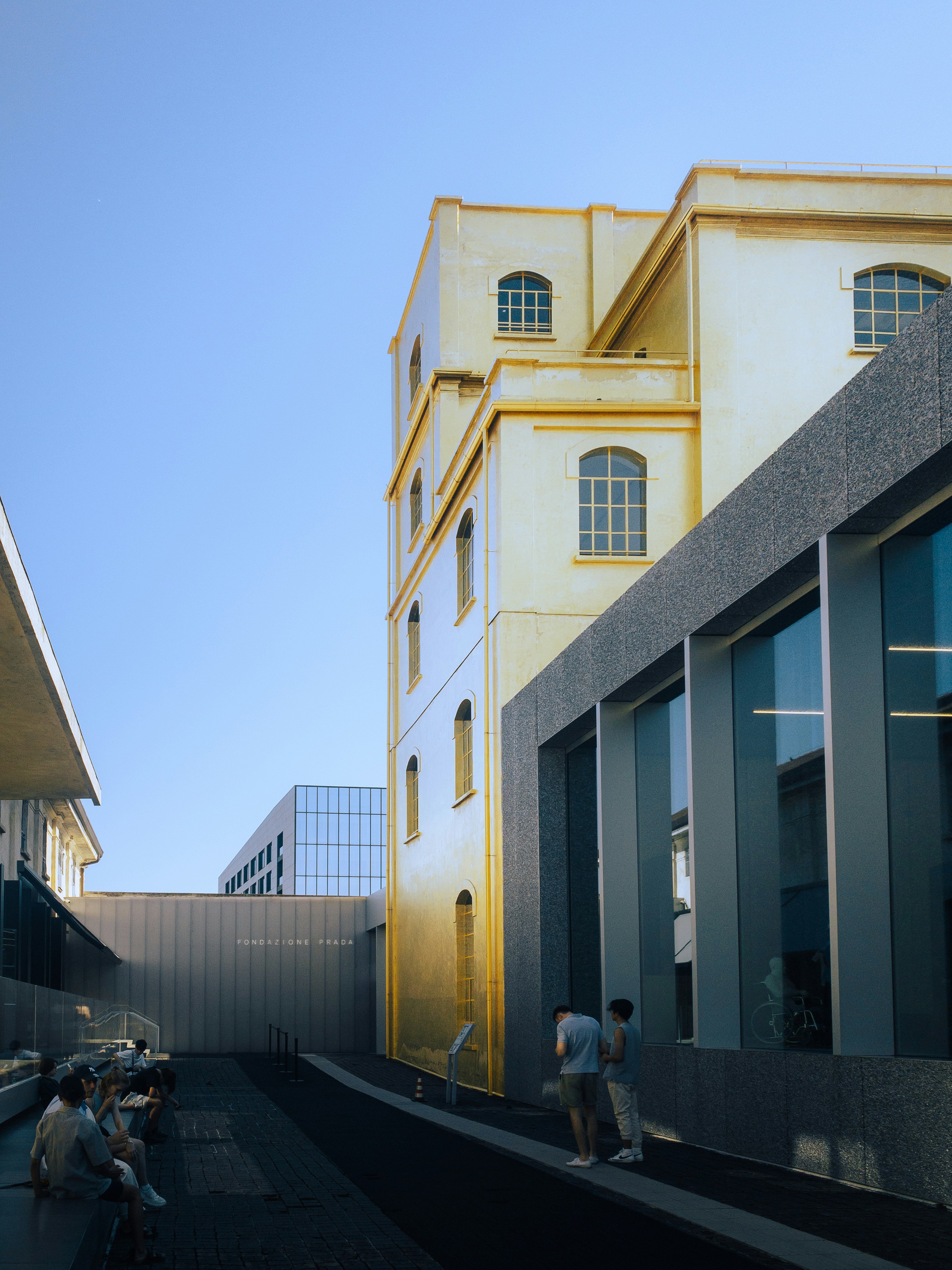 a building with a yellow and white exterior