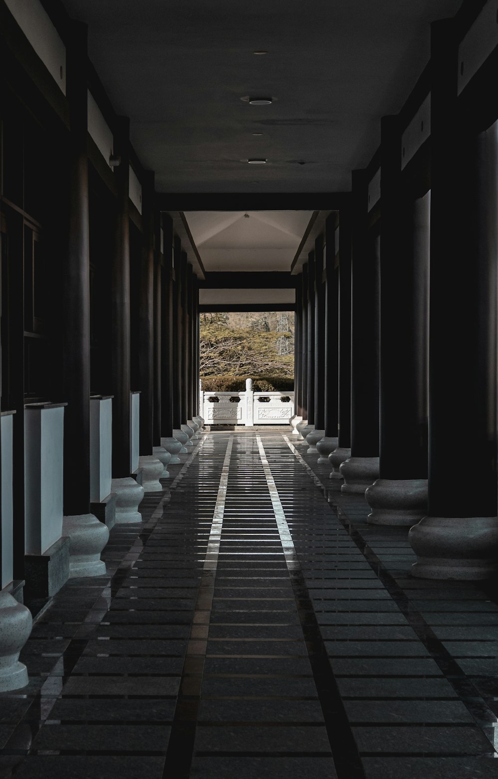 a long hallway with columns