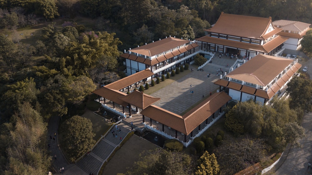 a building with a courtyard and trees around it