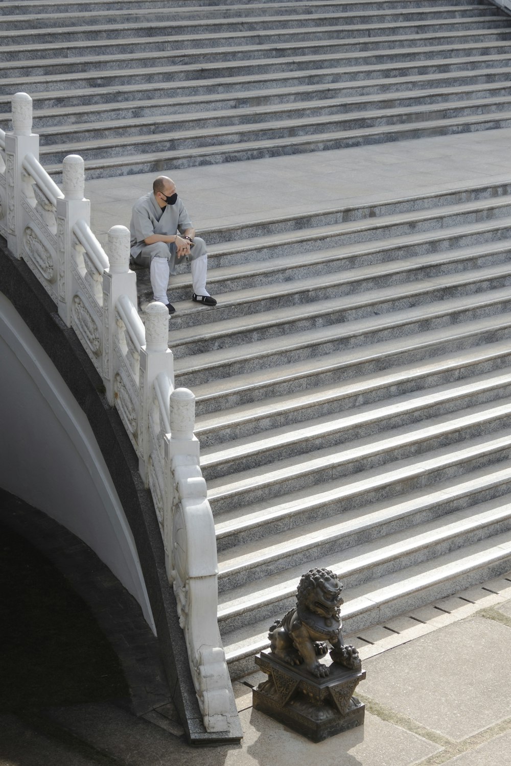 a person sitting on a staircase