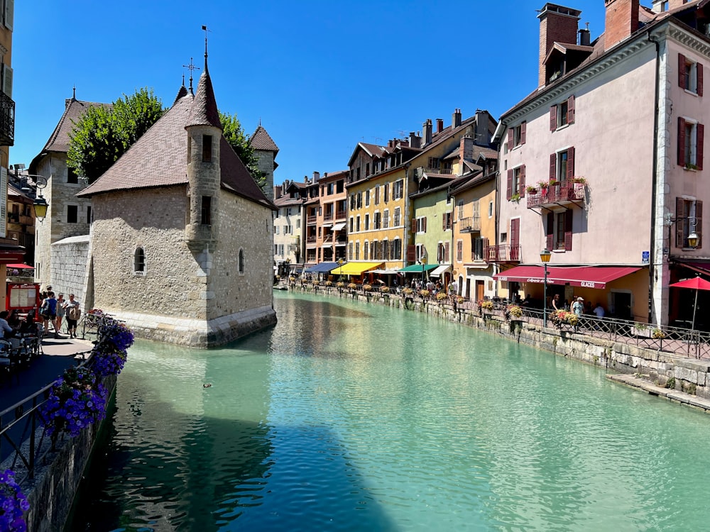 a body of water with buildings along it