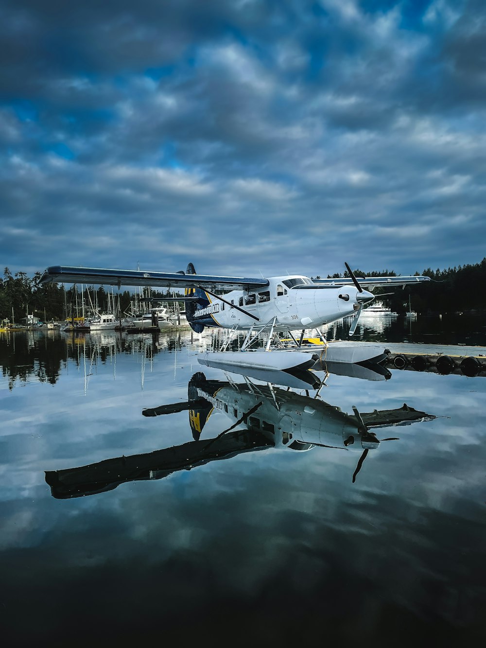 a group of airplanes on a lake