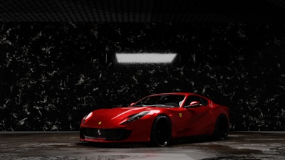 A sleek exotic supercar secured inside a pristine enclosed transport trailer under soft lighting.