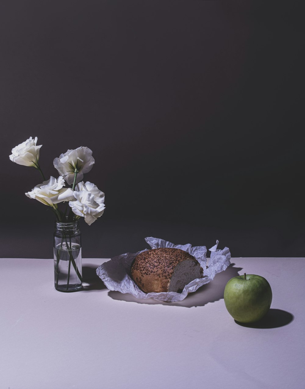 a vase of flowers sitting on a table