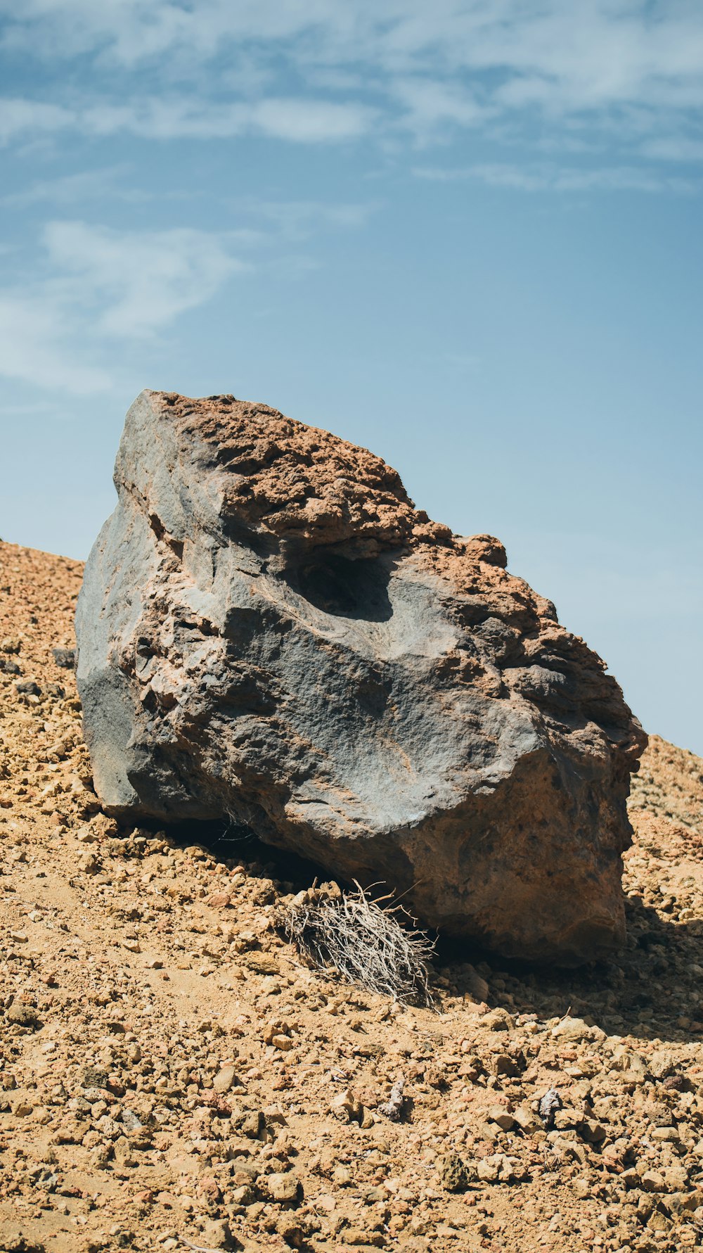 a large rock in the desert
