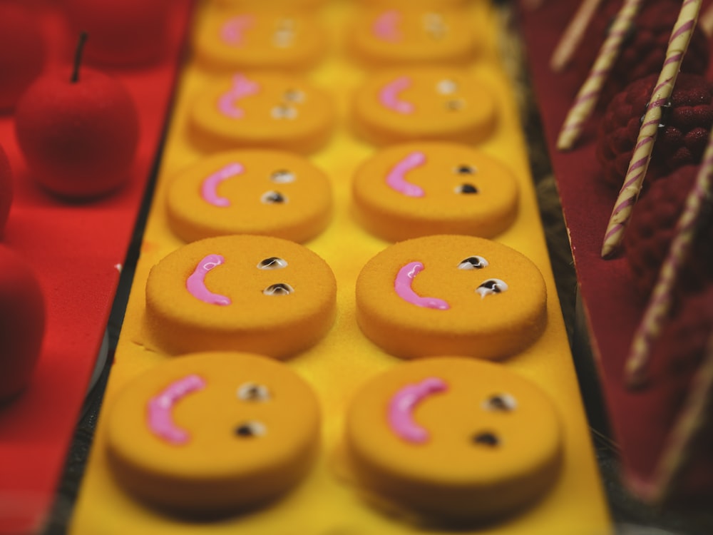 a group of cookies with faces on them