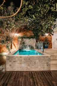 a small pool in a backyard