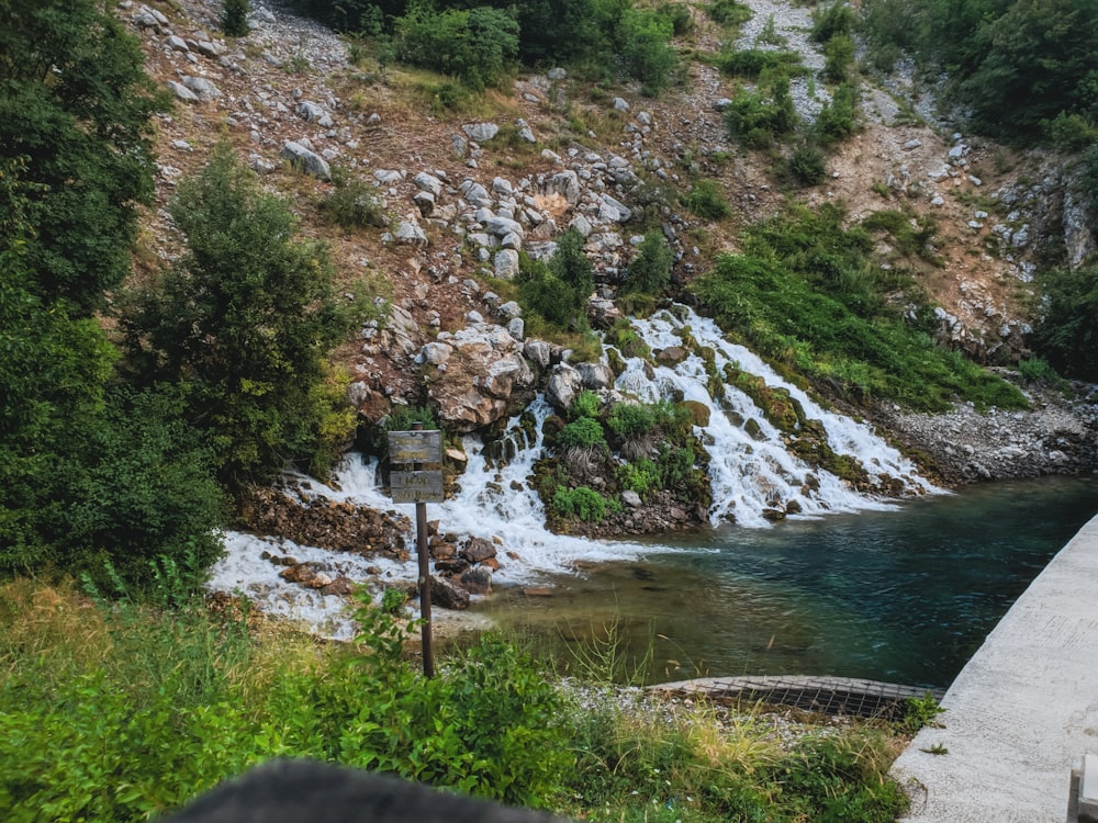 a river with a waterfall