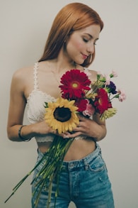 a woman holding flowers