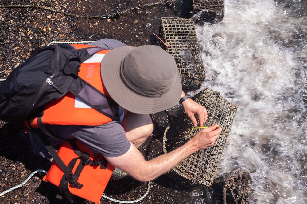 a man holding a fish