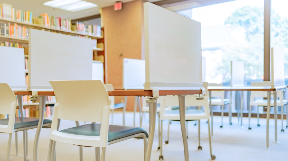 a classroom with desks and chairs