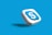 A 3D icon with the letter 'S' in white, encased in a blue cloud-like shape on a white square. It appears to be floating with a shadow cast below it, set against a solid blue background.