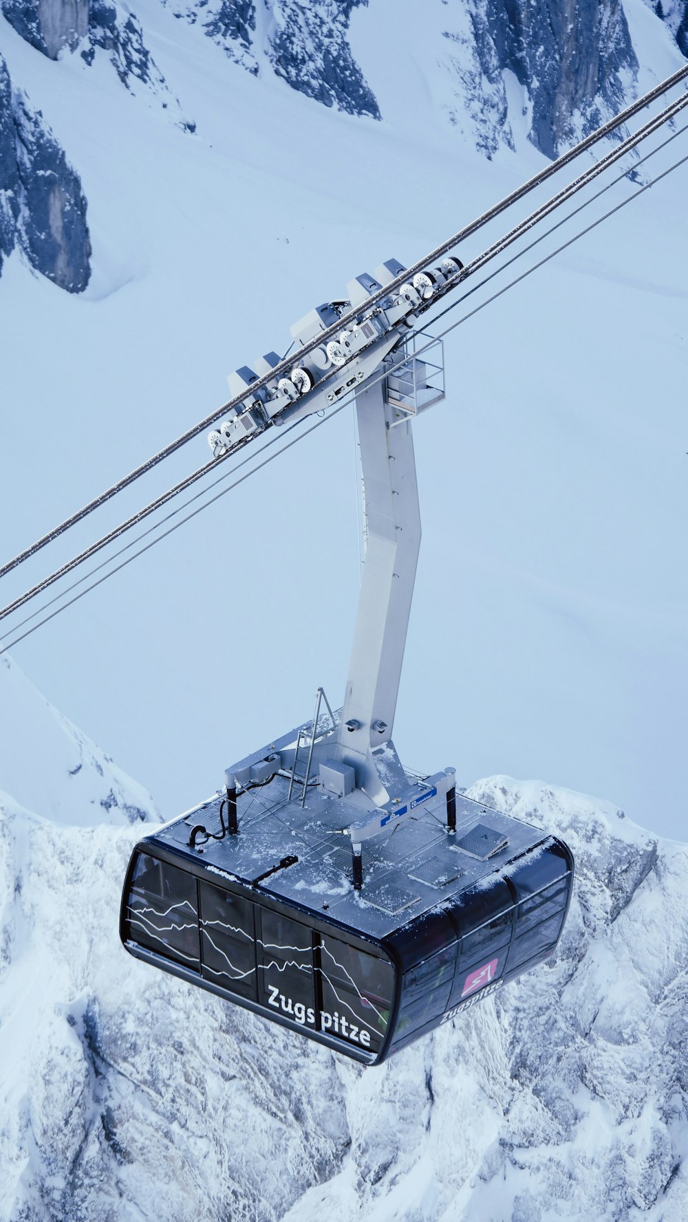 a ski lift in the snow