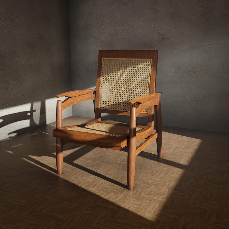 Amherst lounge chair — a wood-framed lounge chair with a woven seat in raking sunlight