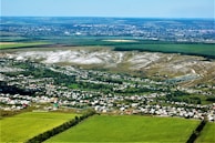 An aerial view of the village, highlighting the landscape and agricultural fields.