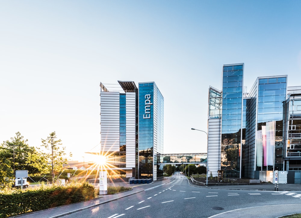 a road with tall buildings on either side of it