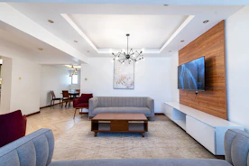 a living room with a couch and a table