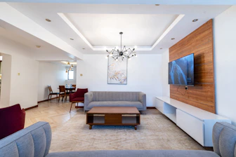 a living room with a couch and a table
