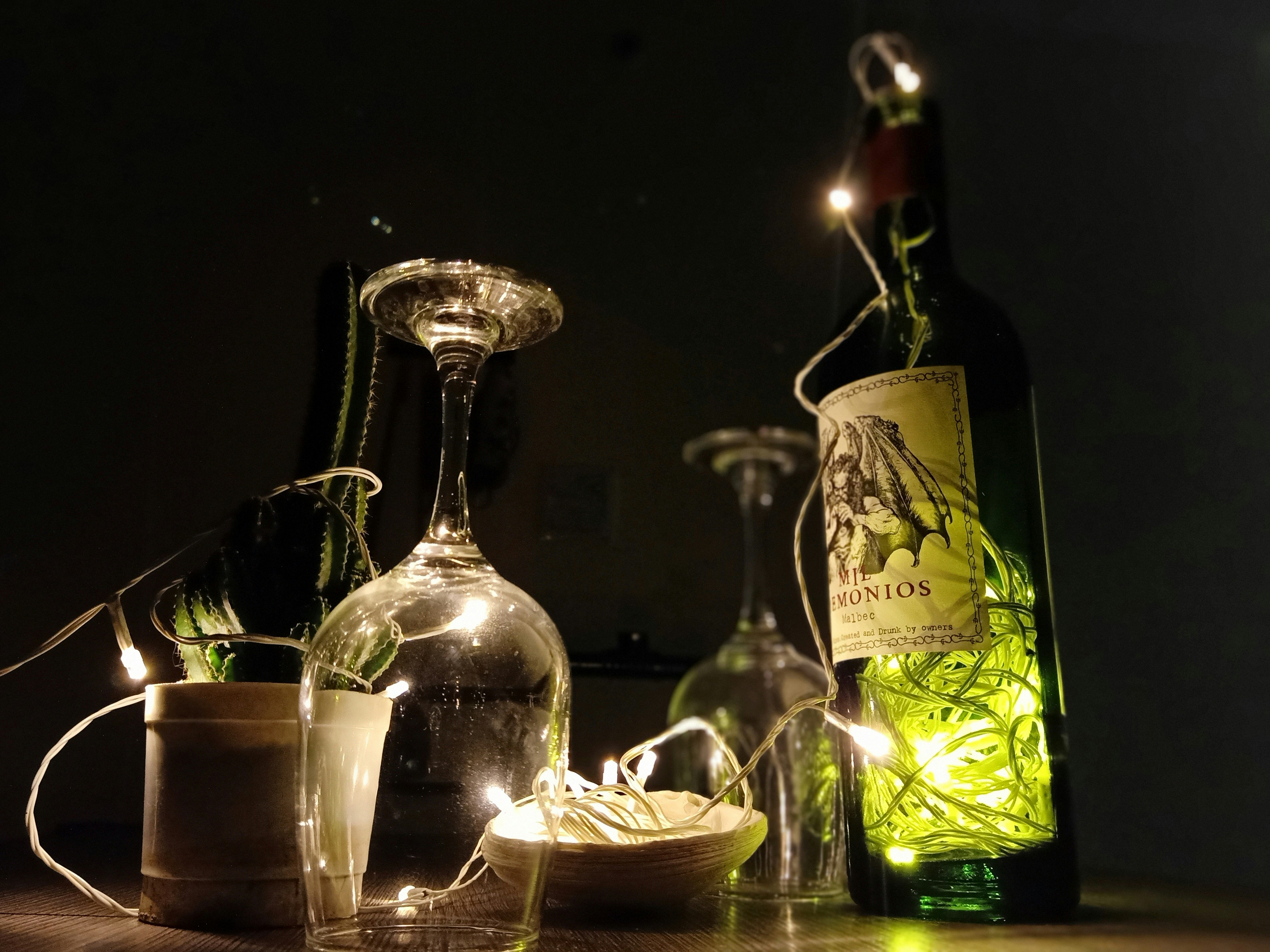 Elegant wine gift set with branded packaging, dark background with warm ambient lighting
