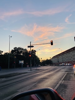 Newly installed LED traffic lights glowing at dusk on a city street corner