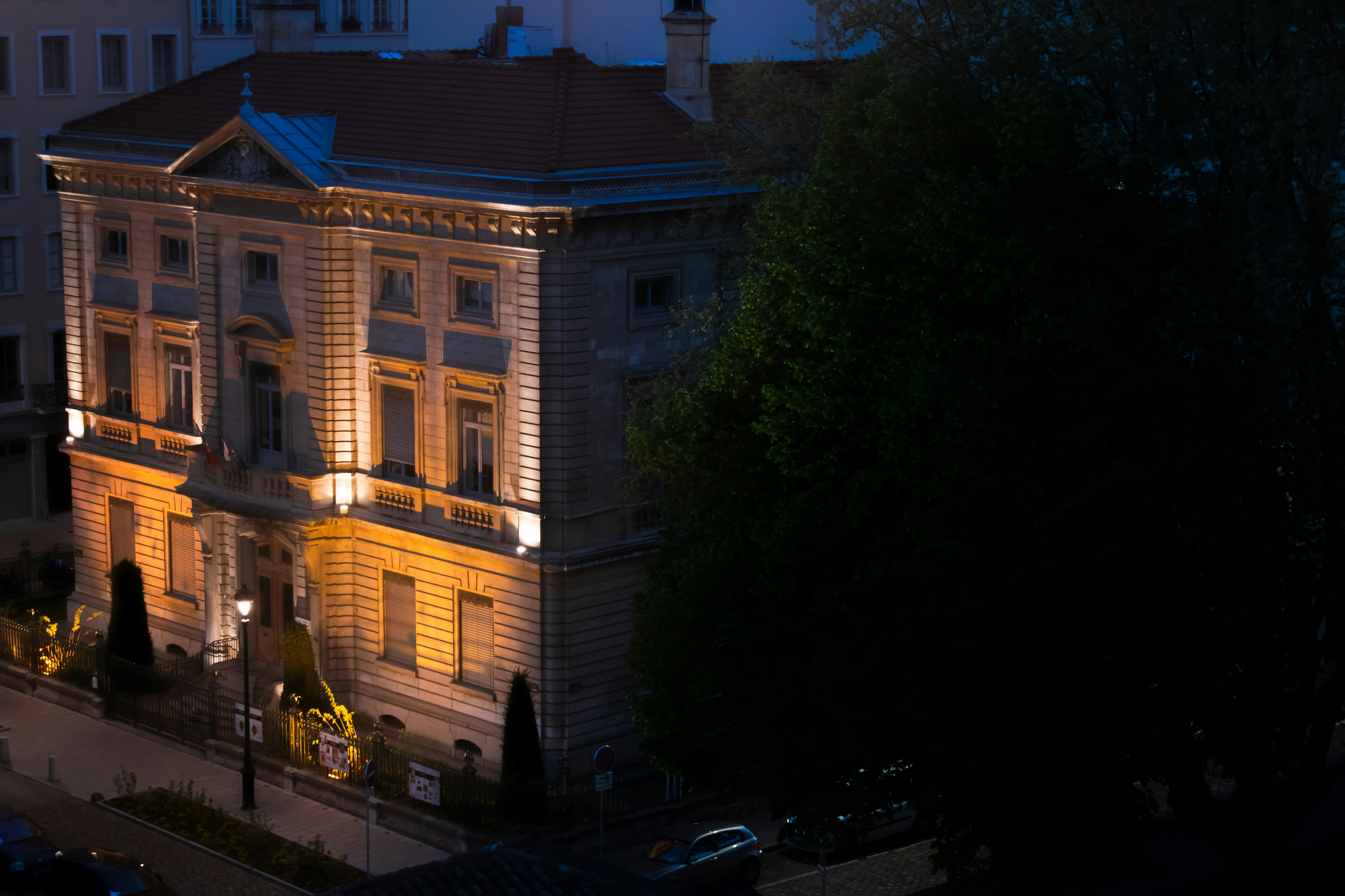 a building with a tree in front