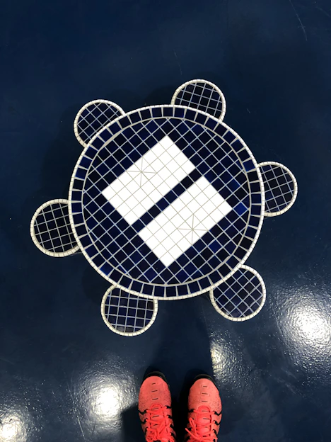 Close-up of beautifully patterned turtle rock floor tiles in warm earthy tones