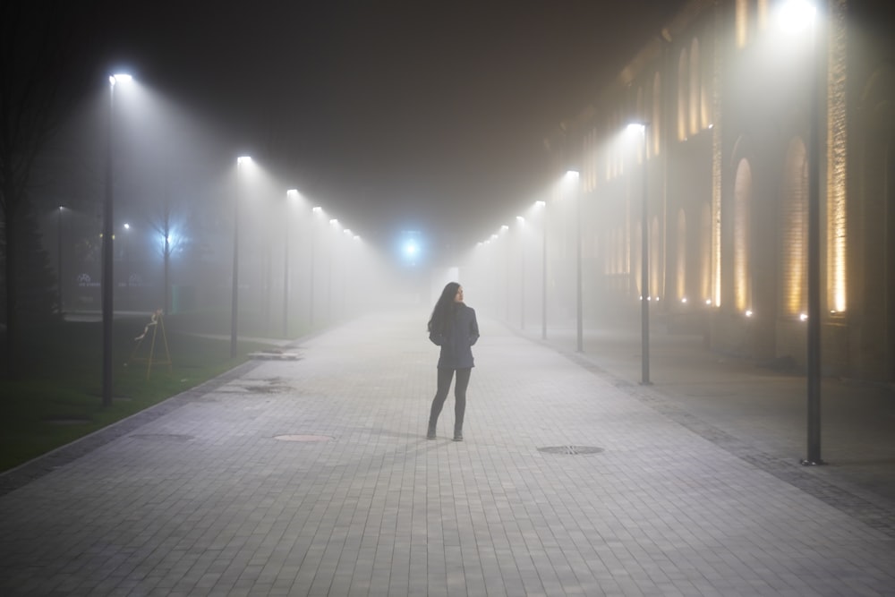 a person walking on a sidewalk