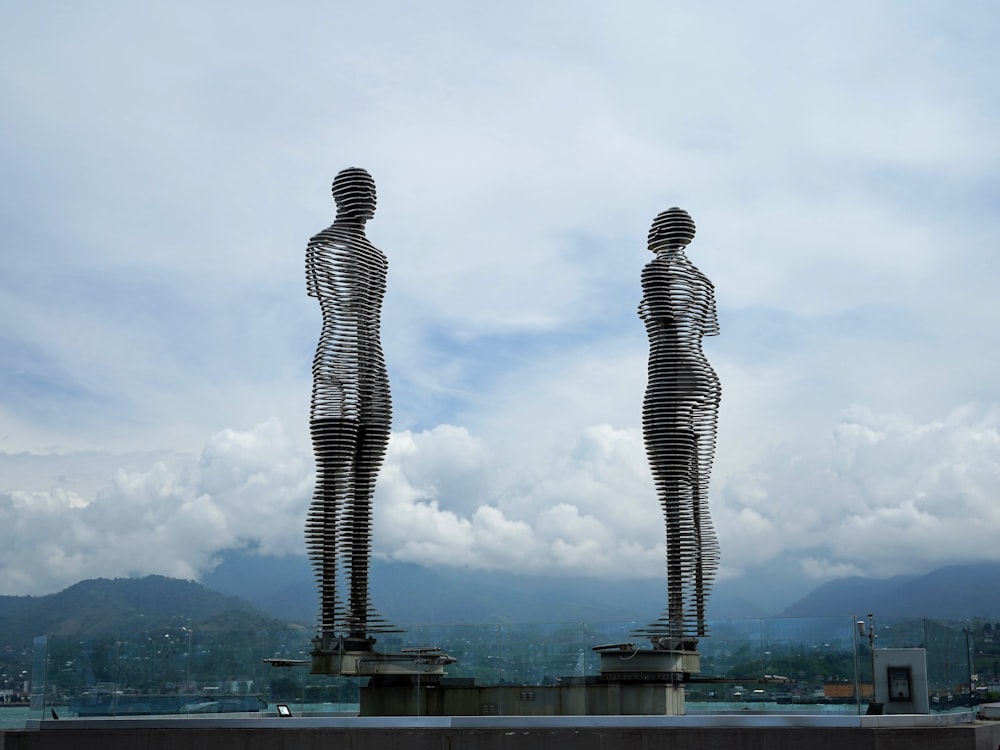 a group of tall statues