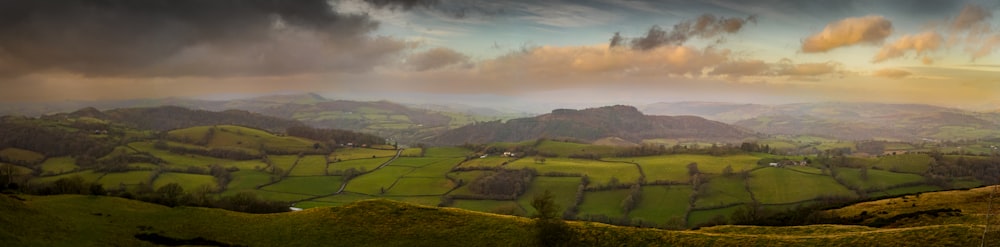 a landscape with hills and trees