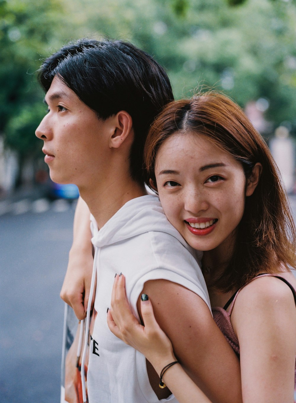 a man and woman posing for a picture