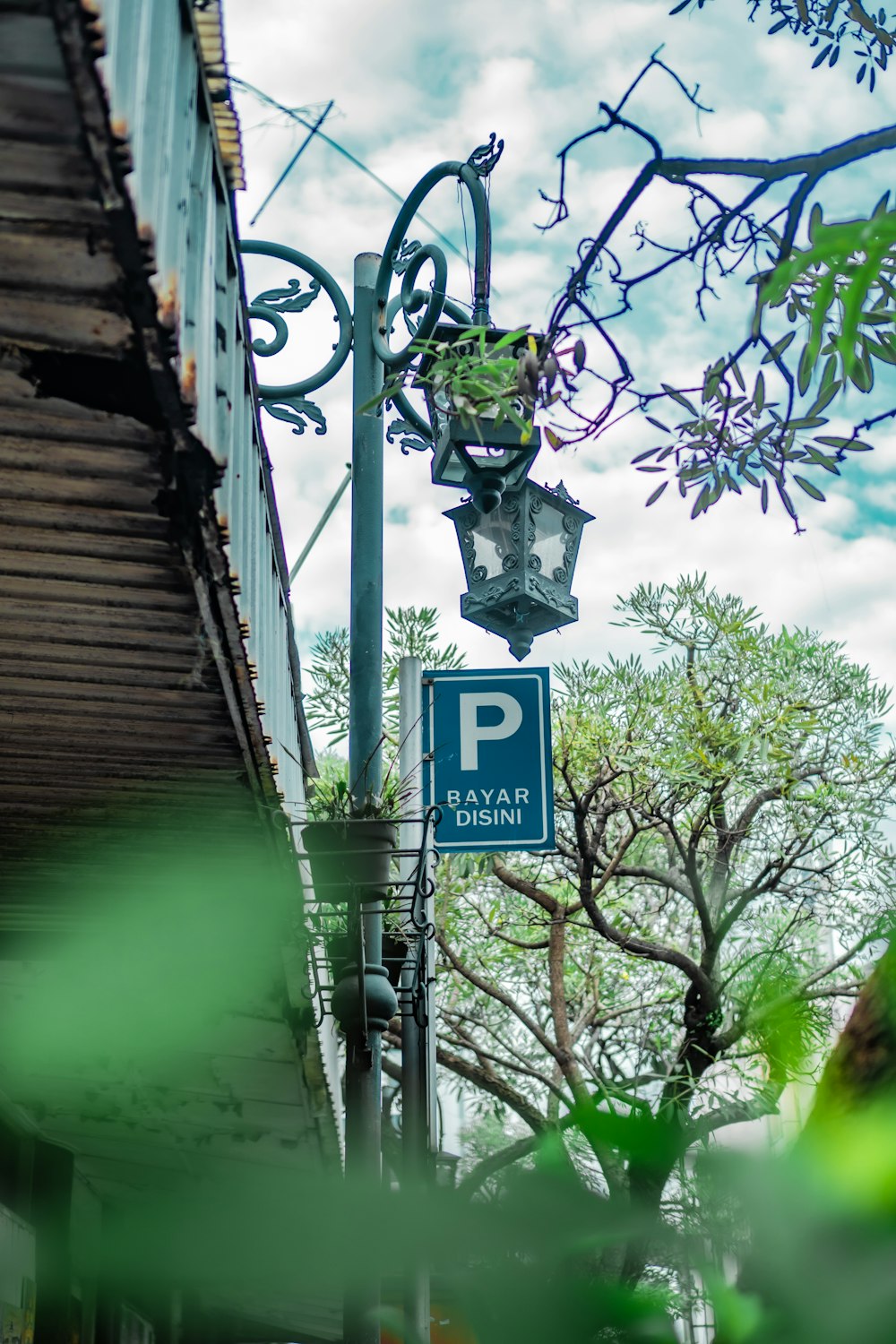 a street sign hangs from a pole