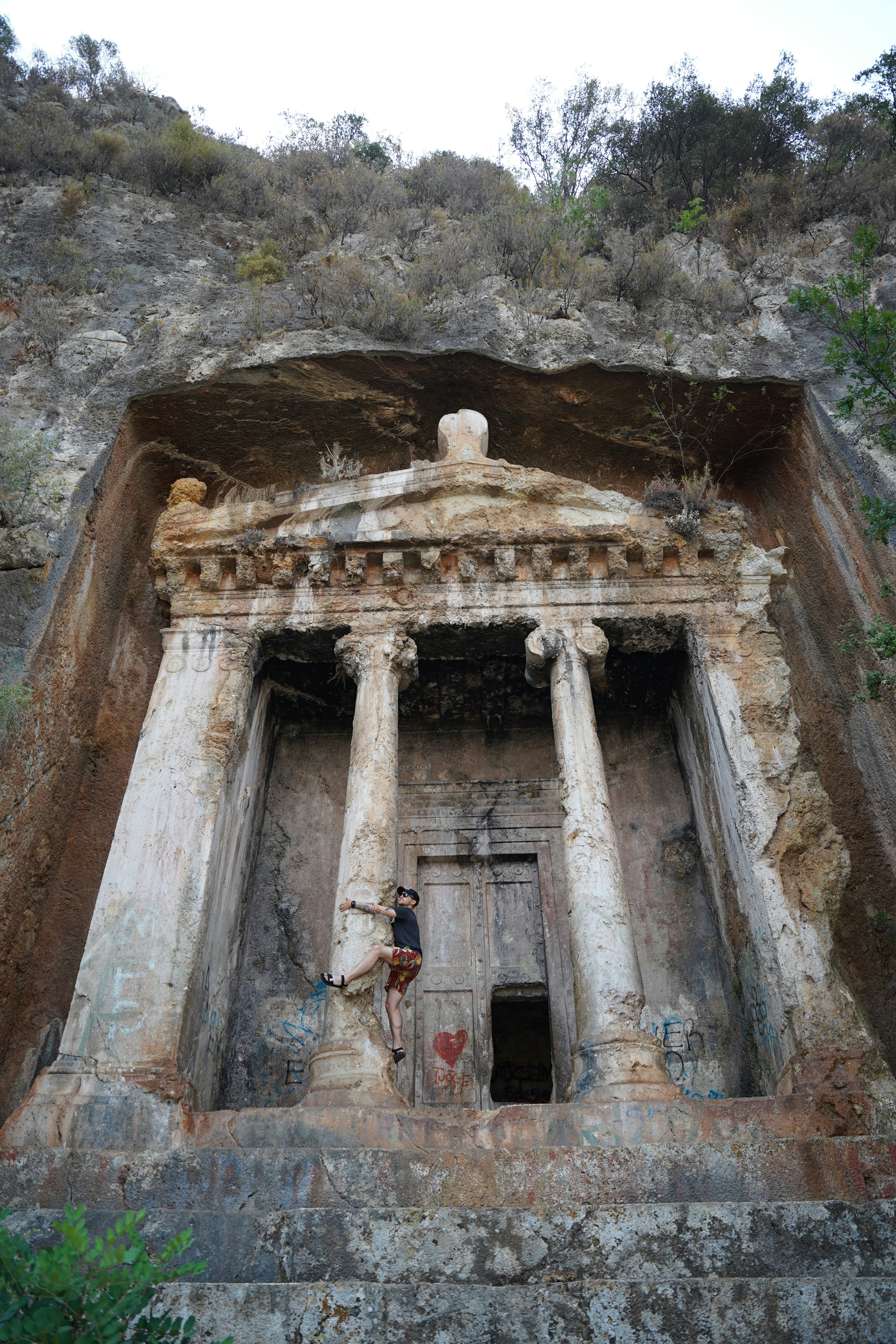 a person climbing a rock wall