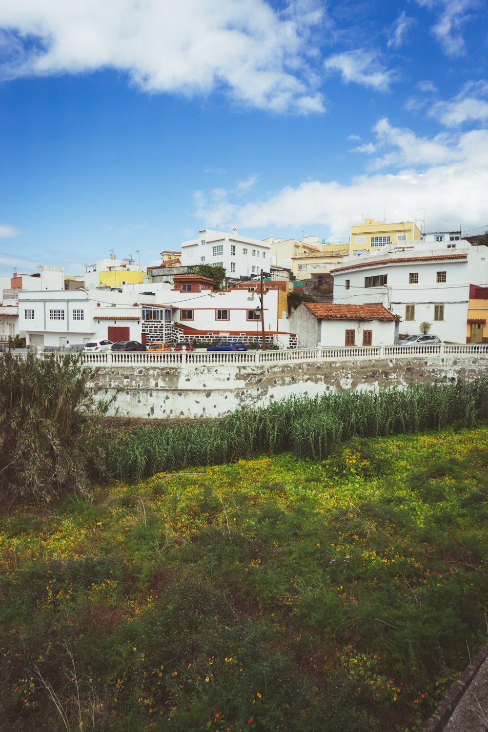 a group of buildings with a bridge