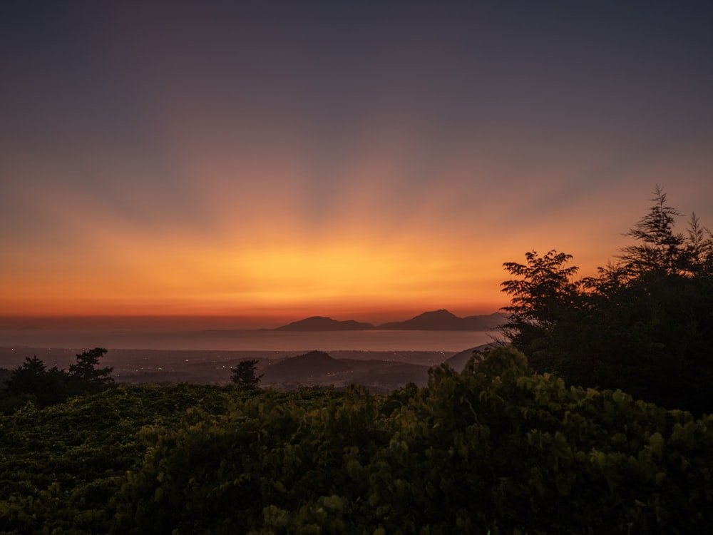 a sunset over a lake