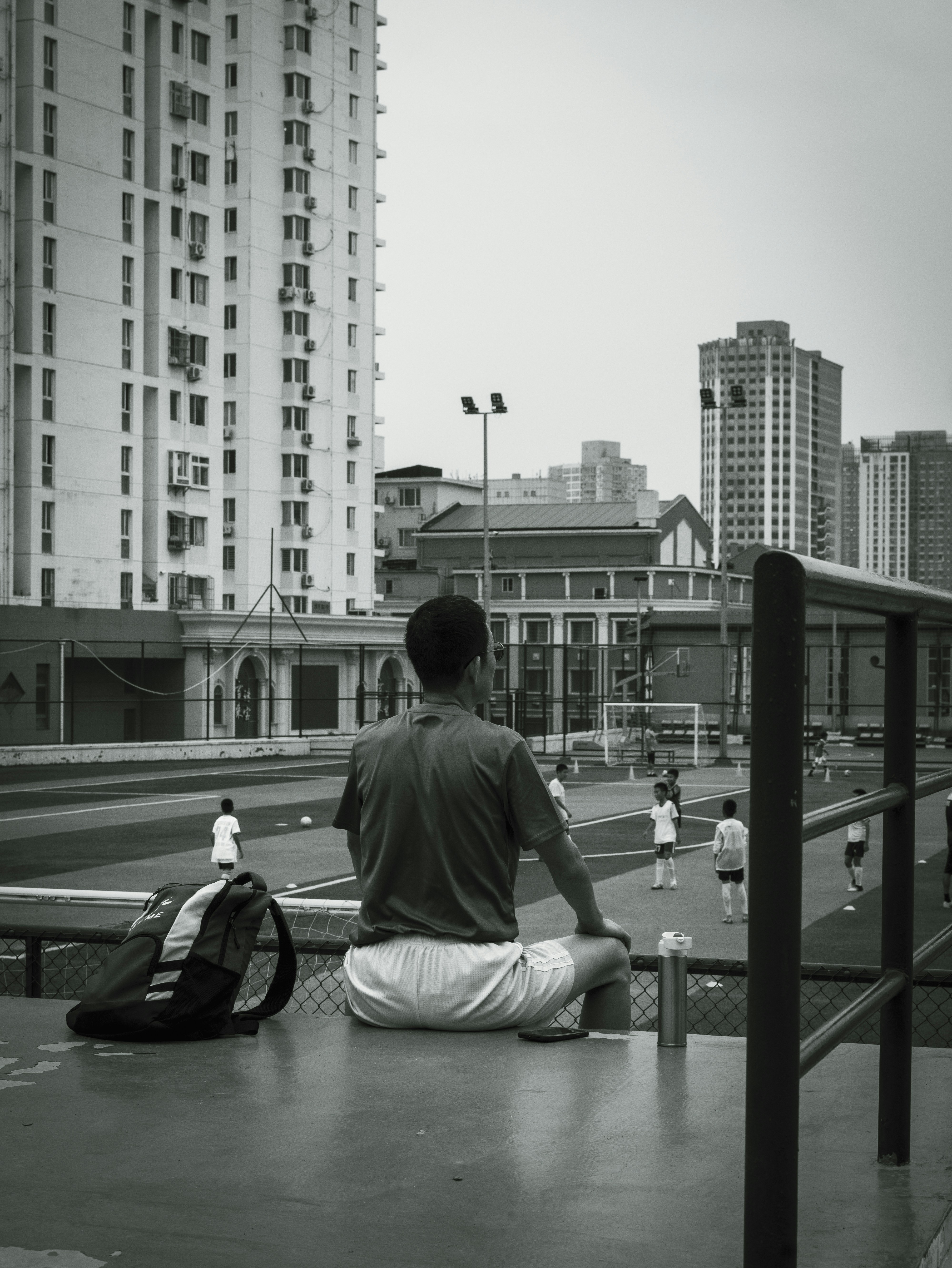 a man sitting on a bench