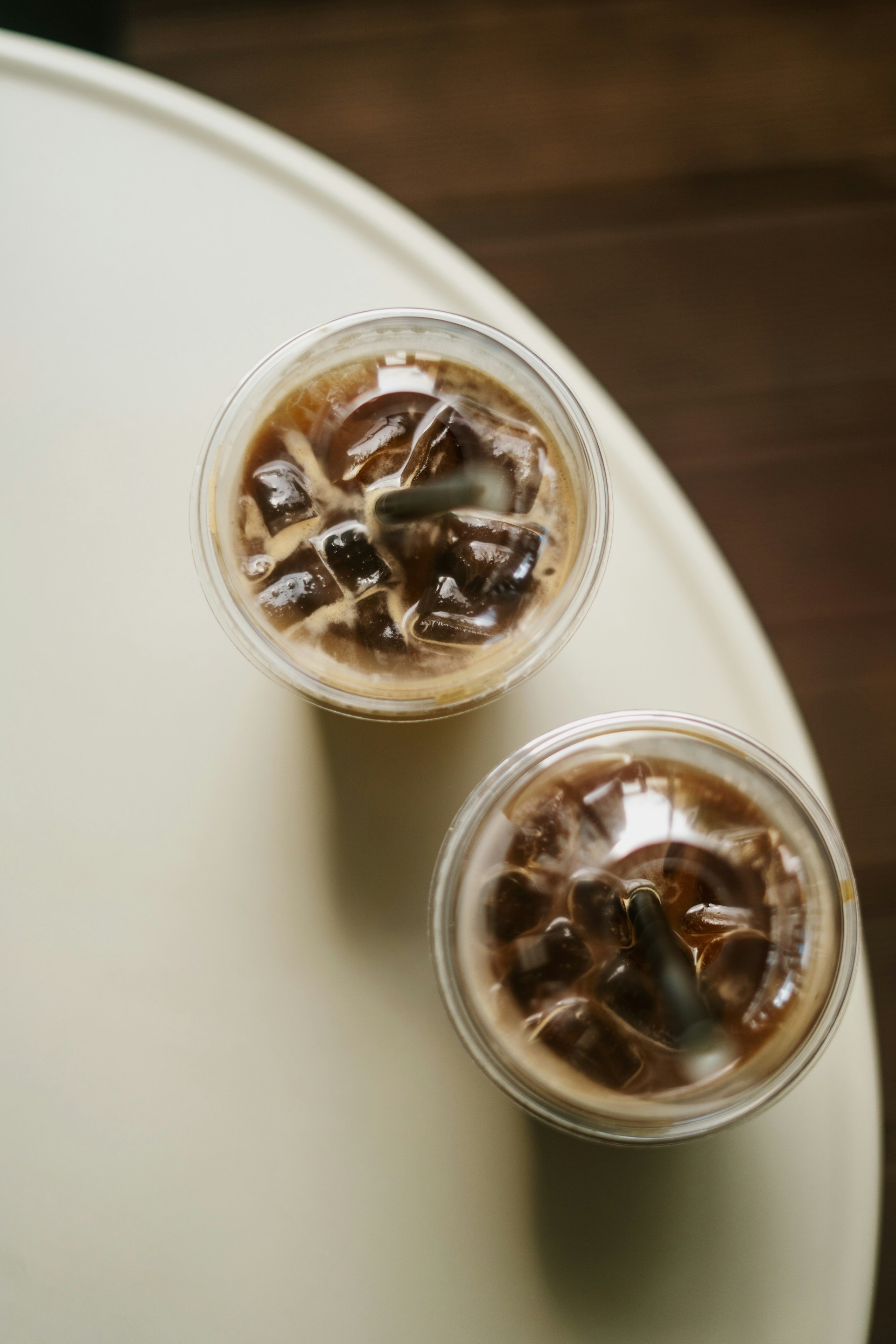 a couple of clear containers with ice