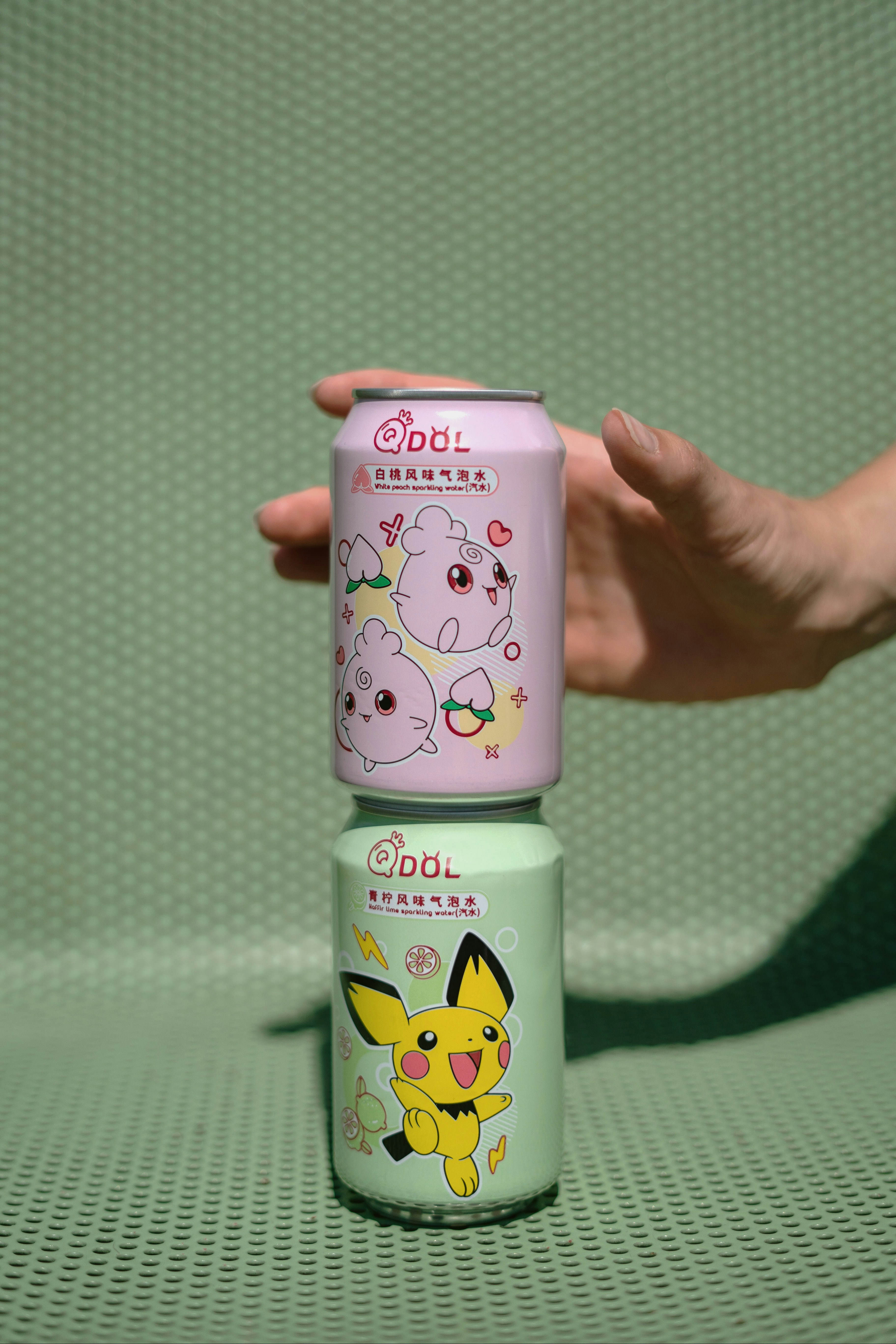 a person holding a bottle