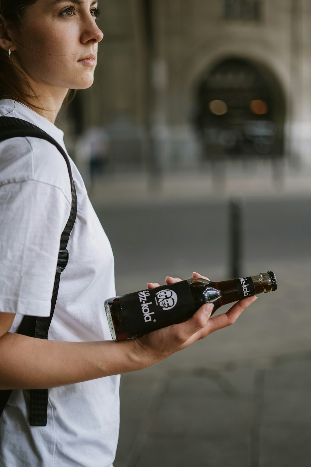 a man holding a bottle