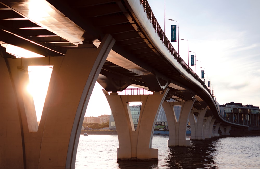 a bridge with many arches over water