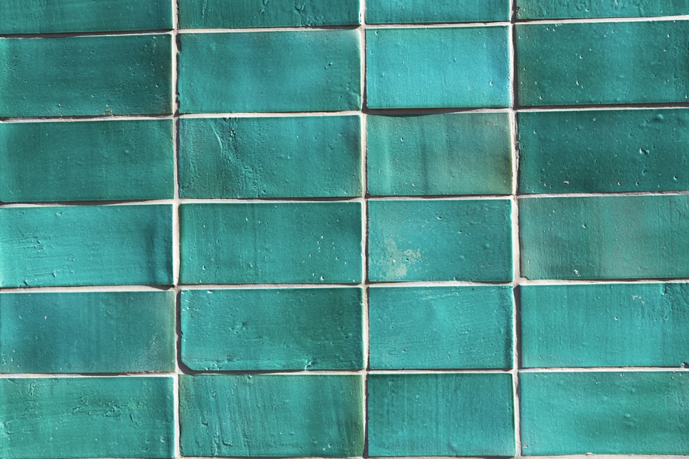 a close up of a blue tile