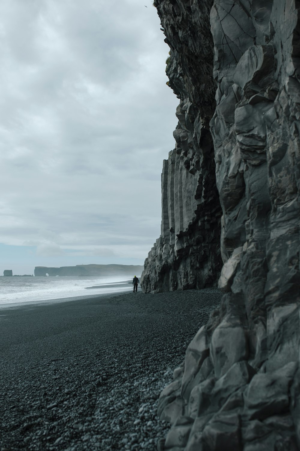 a person standing on a beach