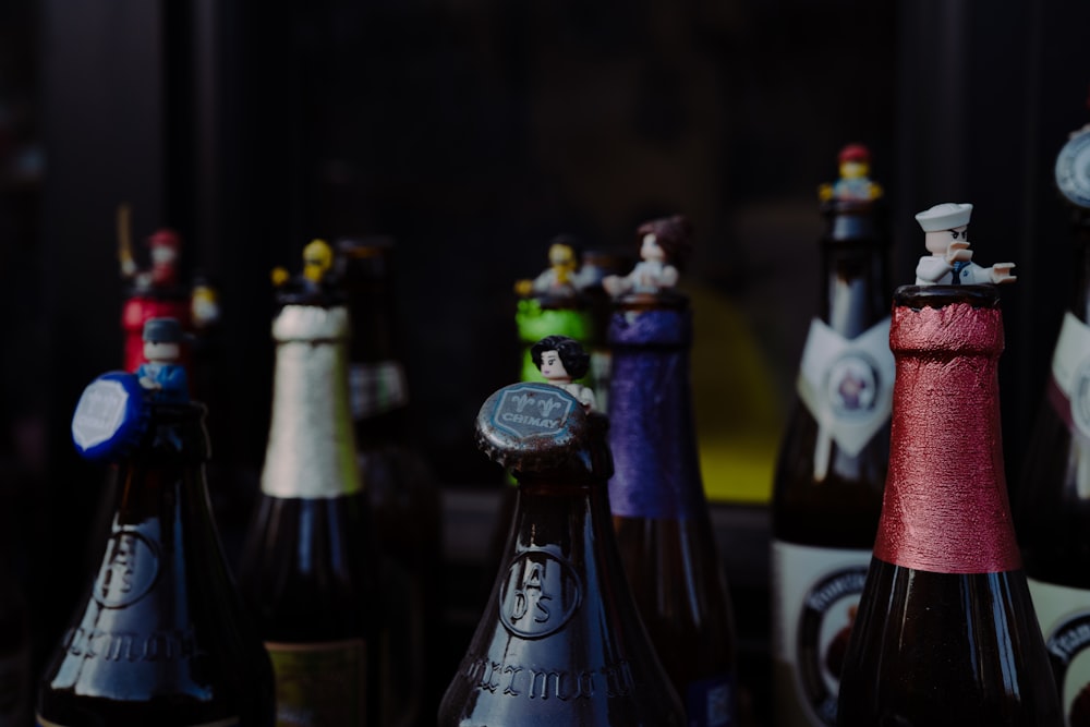 a group of bottles with different colored liquid in them