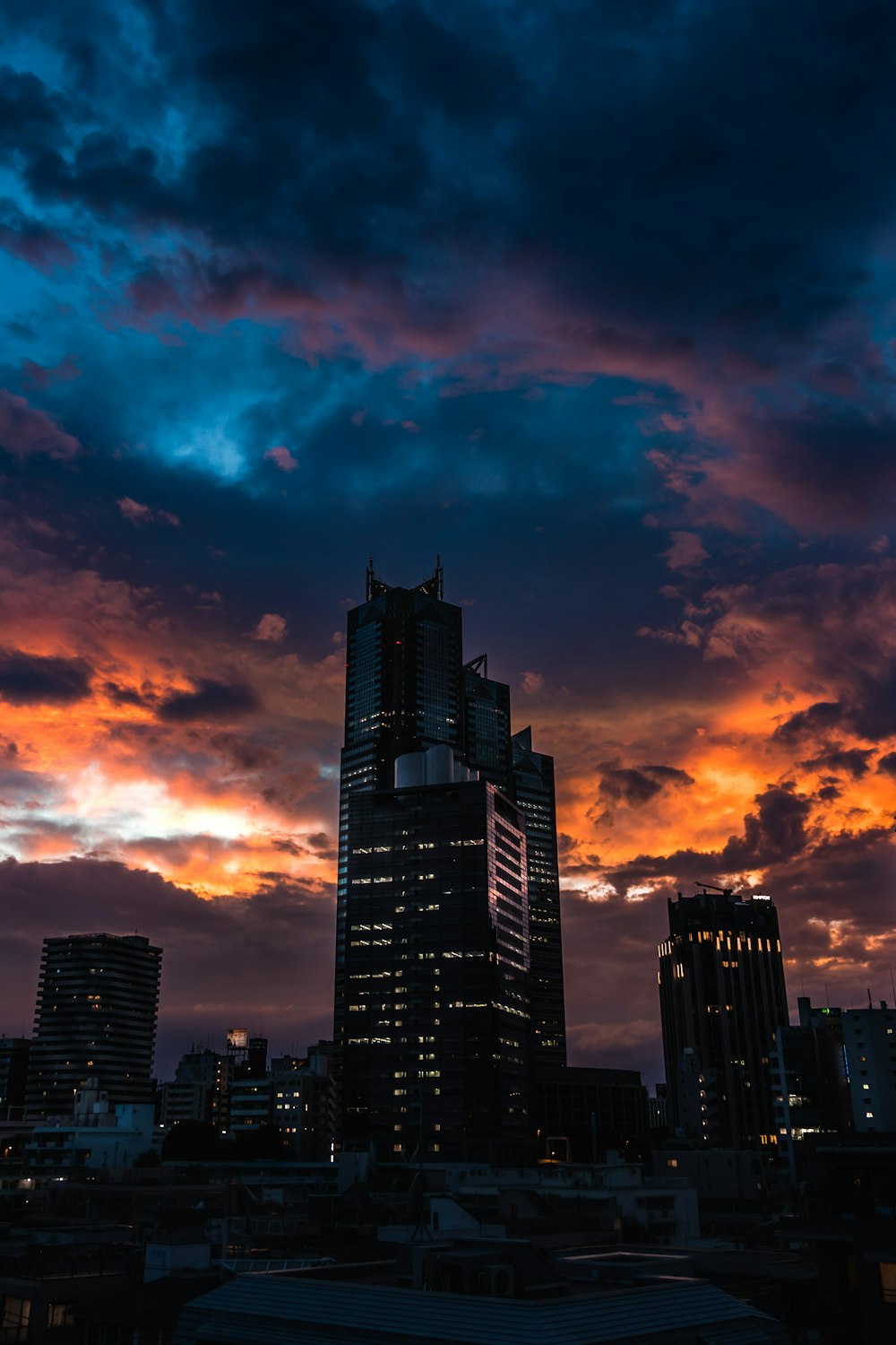 a city skyline at sunset