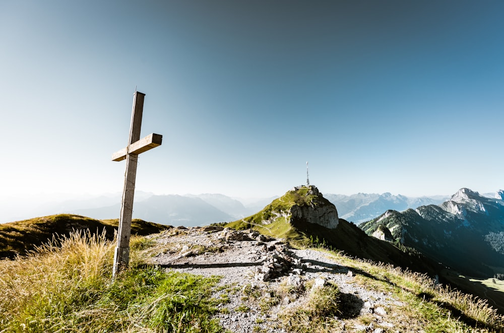 a cross on a mountain