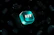 A sleek 3D Taurus zodiac icon illuminated with blue and gold neon gradients floating in space.