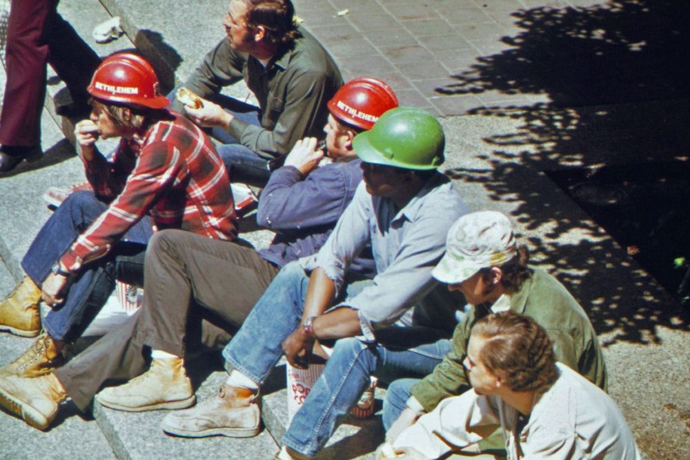 a group of men wearing helmets