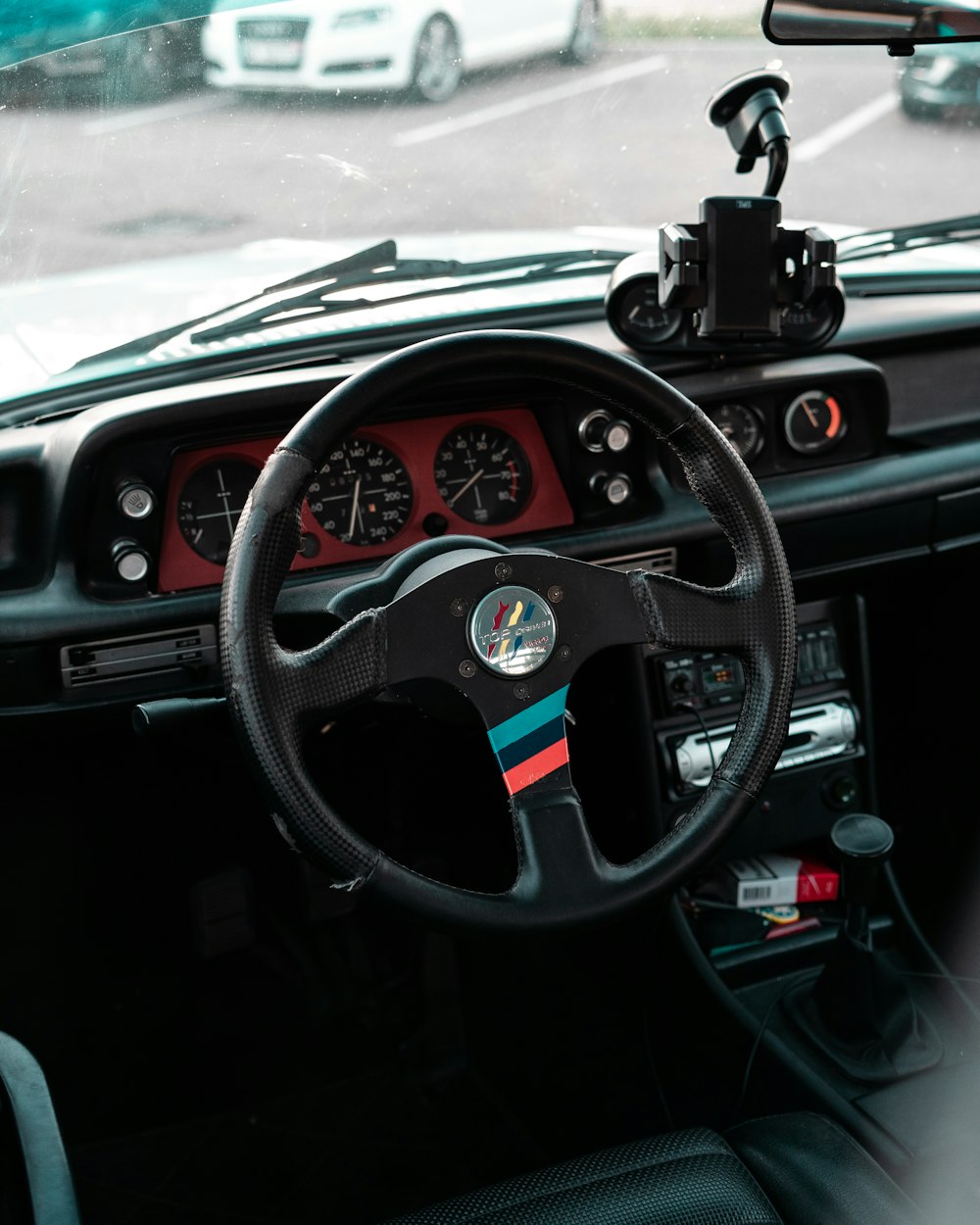 a steering wheel and dashboard of a car