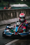 a person driving a go kart
