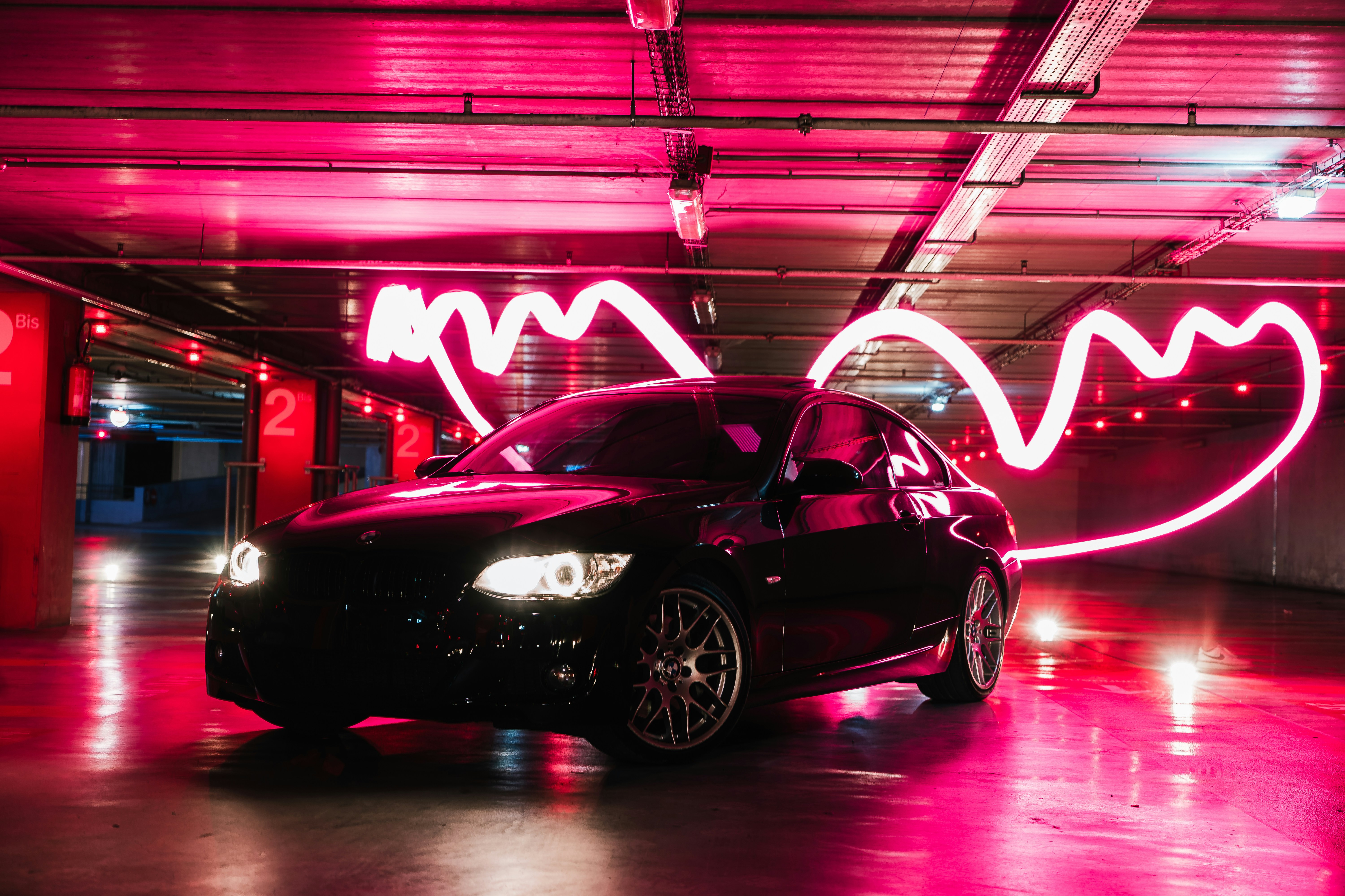 A car with its lights on photo Free Tire Image on Unsplash