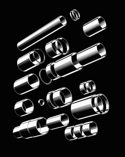 Steel pipe fi 90 and banana arranged artistically against a neutral background